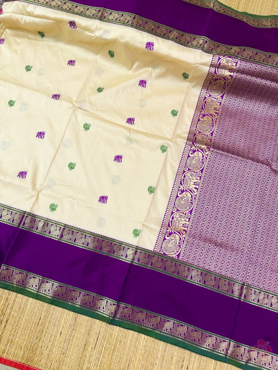 Semi kanjivaram soft silk woven saree. *Intricate weaving resham butties in body and contrast reshamwoven gap borders both sides and woven pallu with attached thread tassels.Pairswith *contrast woven blouse*