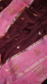Pure viscosegeorgette fabric saree with beautifulchaap dye concept woth beautiful mottifs on saree with rich weaved palluTeamed with contrast blouse as with buttis as shown