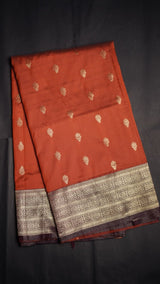 Semi soft silk saree.. Features:All over *traditional butties in the body* *Contrast woven border* *Grand woven pallu with tassels* Pairs with *contrast brocade woven blouse*