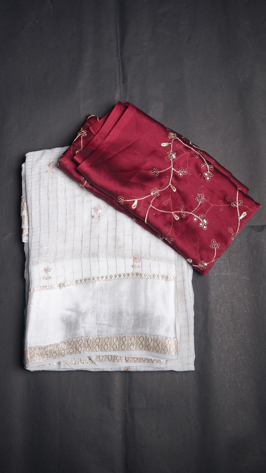 viscose Georgette with all over cheks coming with butti work n sequence work Blouse :-rangoli silk with zari sequence work in all over blouse