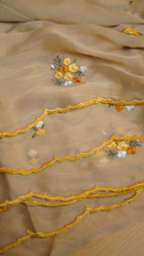 Fabric - Star Georgette Floral Thread Embroidery Work With Scalloped Cutwork Border Blouse - Contrast Embroidery Work BlouseSaree cut - 5.5 meter Blouse cut - 0.8 meterWeight - 550 Grams