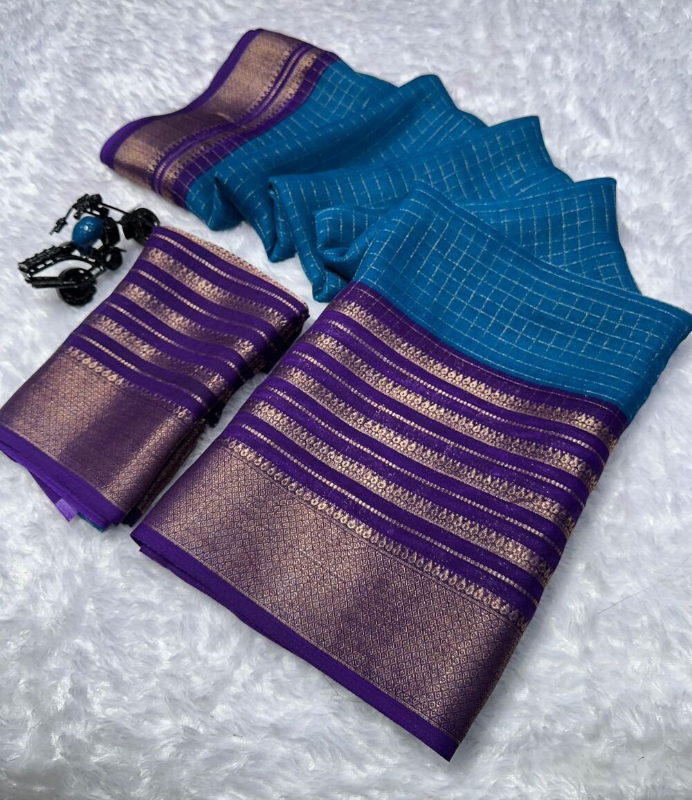 Mysore crepe silksSoft mysore crepe with zari chex pattern and contrast zari lining concept border with contrast crepe blouse Soft n flowy material, very comfortable to wear
