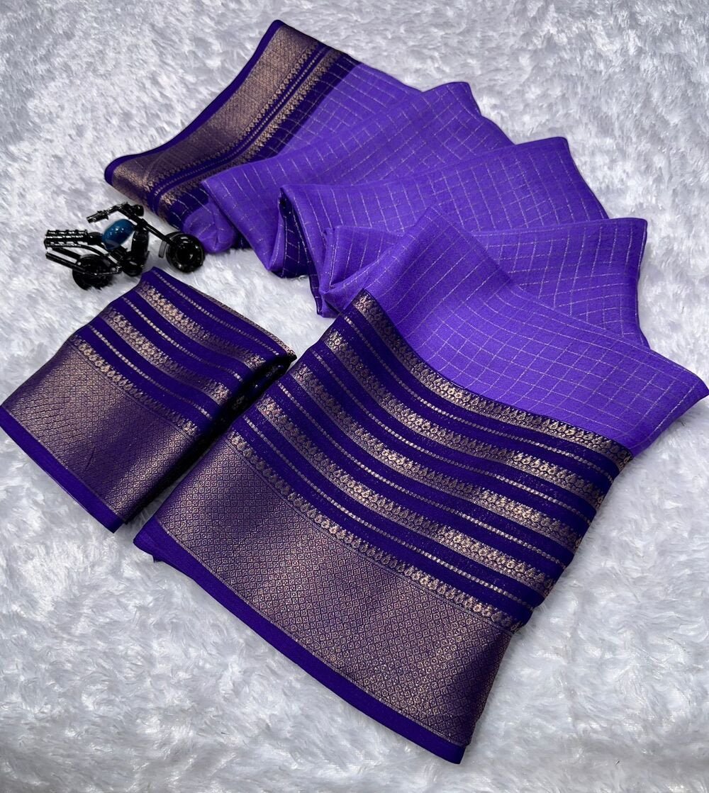 Mysore crepe silksSoft mysore crepe with zari chex pattern and contrast zari lining concept border with contrast crepe blouse Soft n flowy material, very comfortable to wear