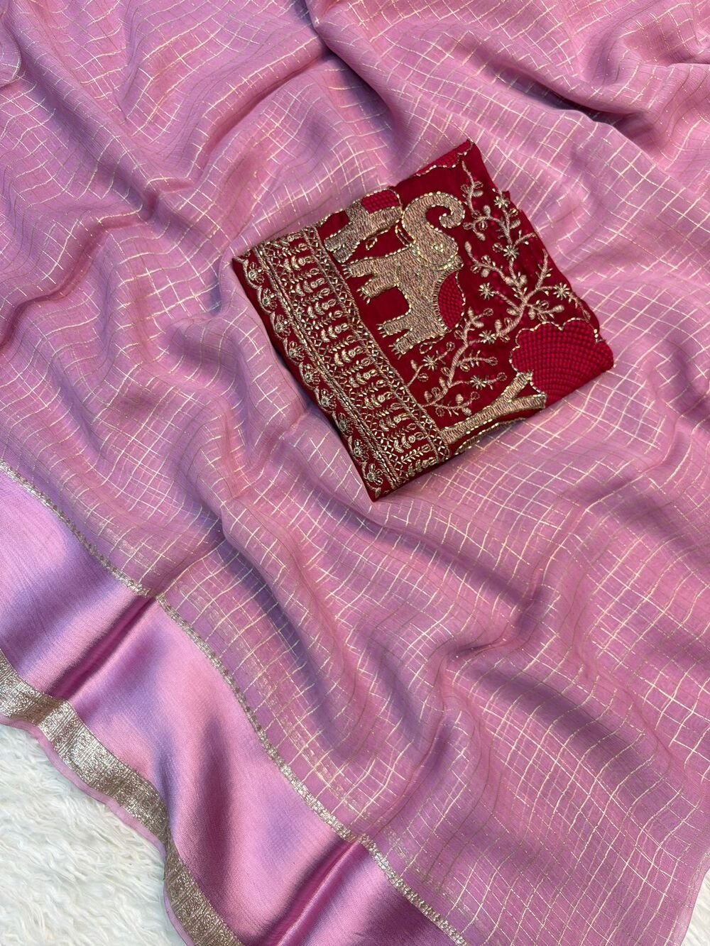 Georgette ChexViscose Georgette saree with zari chex weaving all over Saree and satin borderComes with contrast marron colour beads embroidery work Blouse