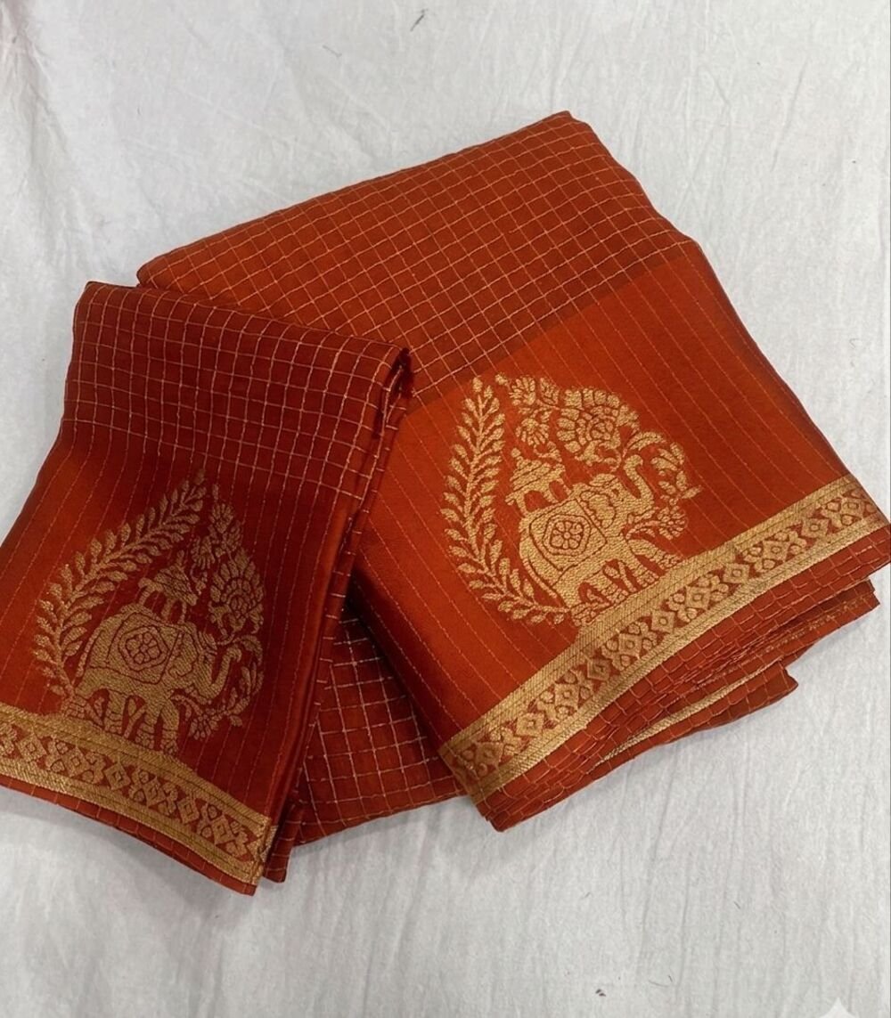 viscose chinon saree with zari chex weaving all over and elephant motif weaving in panel with running pallu and viscose chinon weaving running blouse