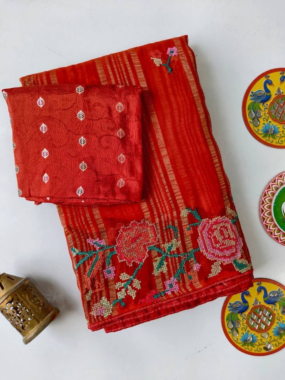 Soft chiffon saree withfancy weaving patta all with 6 needlepetite point workwith all over buttis on sareeTeamed with 1 mtr viscose diable blouse peice with weaving buttis