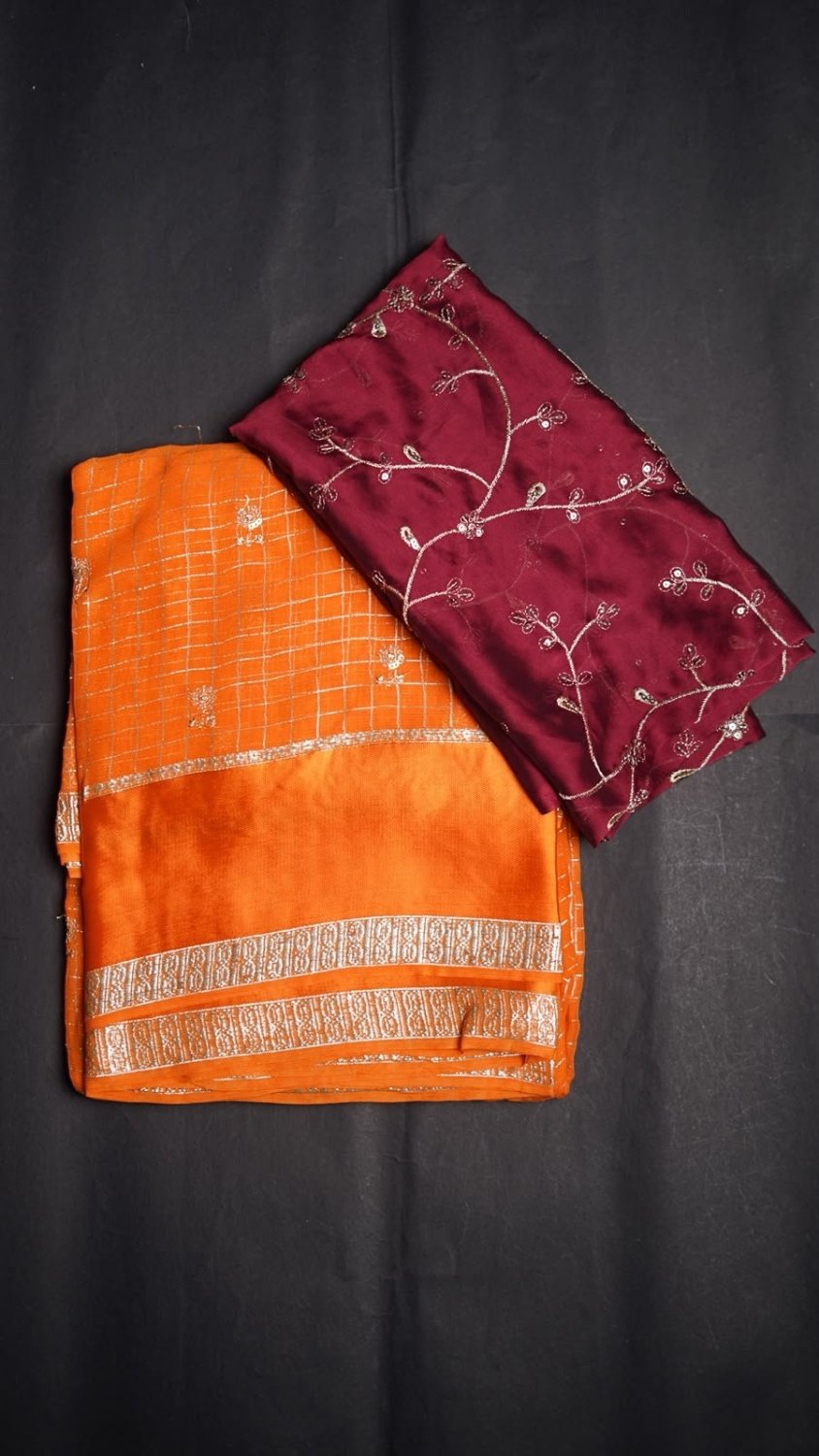 viscose Georgette with all over cheks coming with butti work n sequence work Blouse :-rangoli silk with zari sequence work in all over blouse