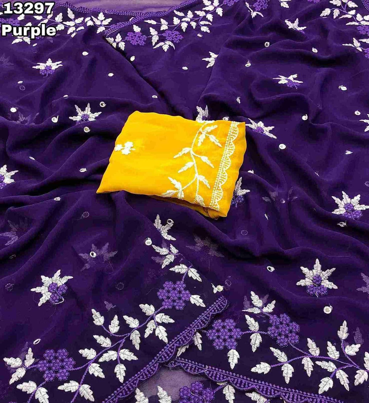 Fabric - Georgette With Floral Design Embroidery With Scalloped Cutwork Border & Foil Mirror Work Allover   Blouse - Contrast Embroidery Work Blouse      Saree cut - 5.5 meter    Blouse cut - 0.8 meter       Available in 6 colours    Weight -  590 Grams