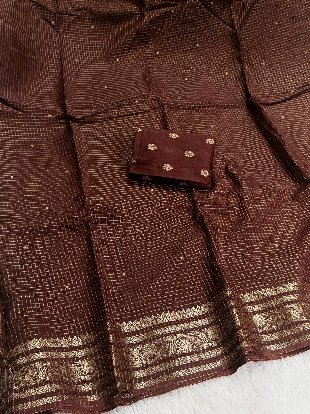 Viscose Russian ChexPure viscose russian chex saree with zari butti all over and zari border both sideswith running Zari lining chitt pallu and viscose jacquard weaving blouse