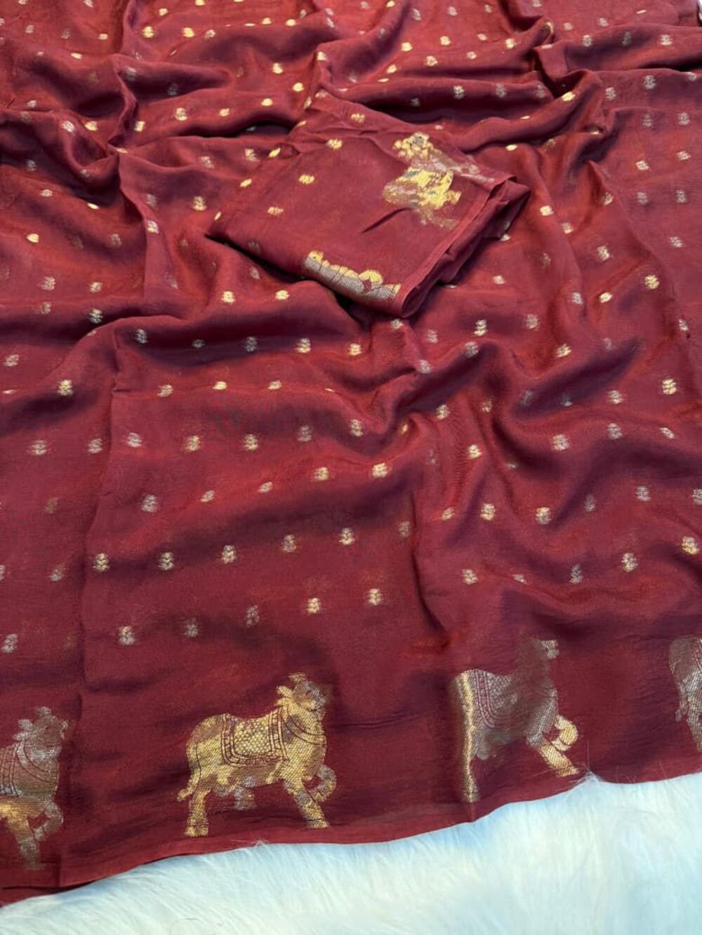 Pure viscose russian crepe saree with pichwai jacquard zari weave design in panel and butti weaving in bodyPaired with running blouse