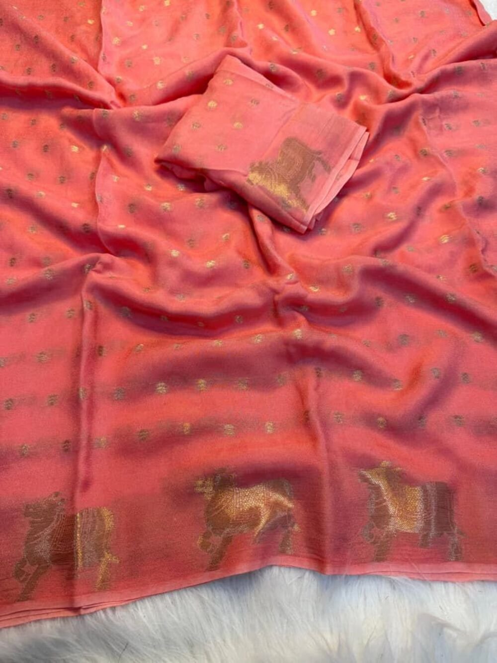 Pure viscose russian crepe saree with pichwai jacquard zari weave design in panel and butti weaving in bodyPaired with running blouse