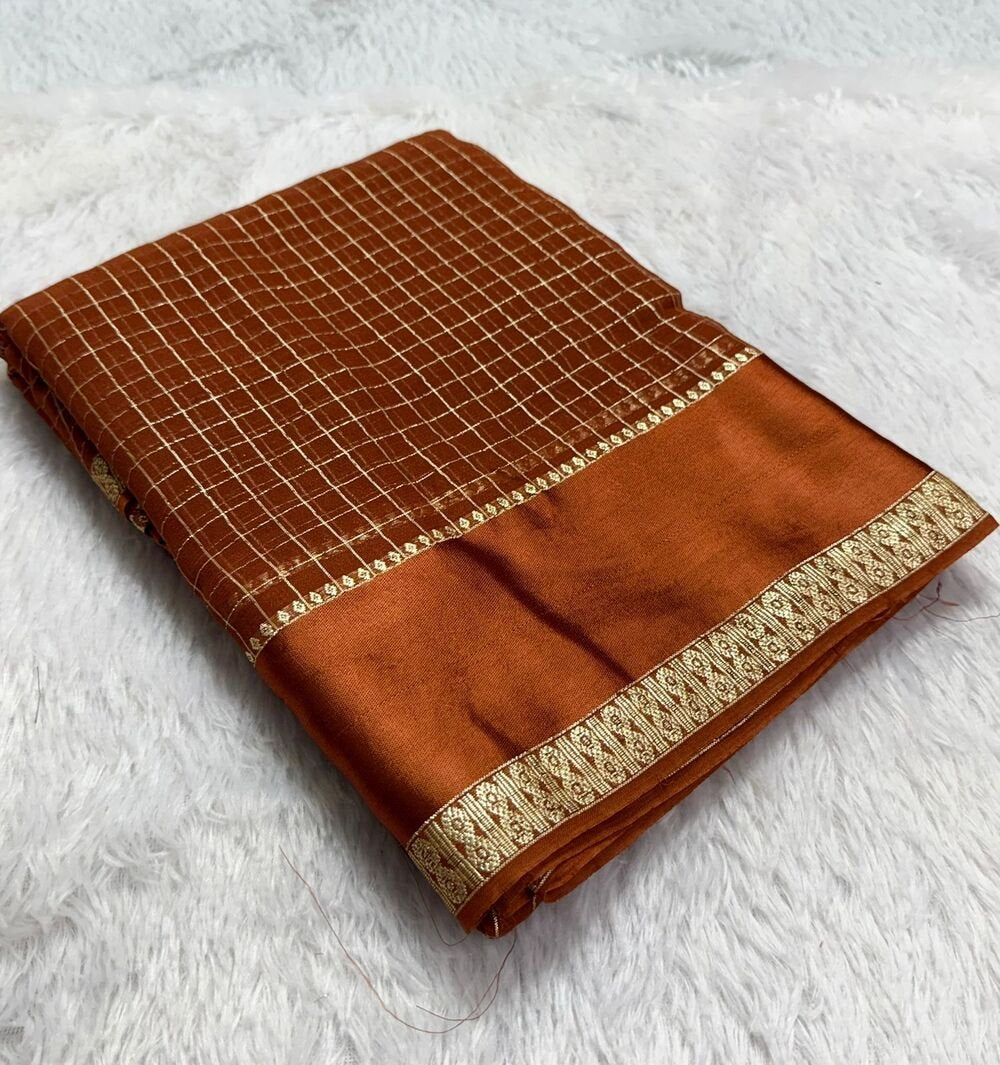 Pure Viscose Georgette saree with lurex thread chex weaving all over Saree With satin borderComes with viscose georgette Blouse