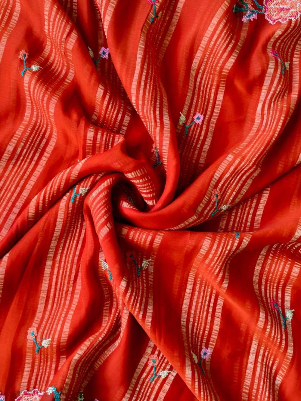Soft chiffon saree with  fancy weaving patta all with 6 needle  petite point work  with all over buttis on saree  Teamed with 1 mtr viscose diable blouse peice with weaving buttis