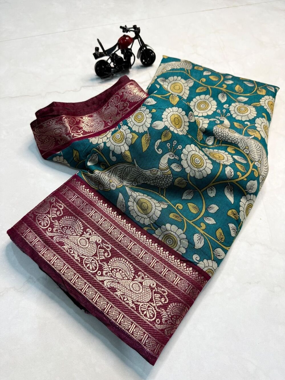 Soft Mangalagiri silks with superhit kalamkari design in body and zari border With running blouse Soft n flowy material, very comfortable to wear..