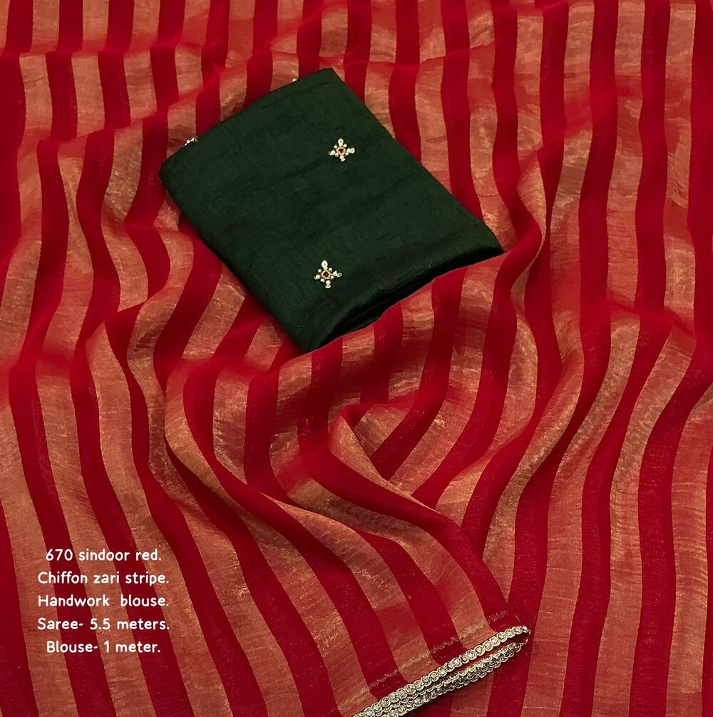 Soft chiffon saree with zari woven stripes allover. Beautiful stone work lace. Contrast Manipuri georgette blouse with handwork butties. Saree- 5.5 meters. Blouse- 1 meter. - Image 2
