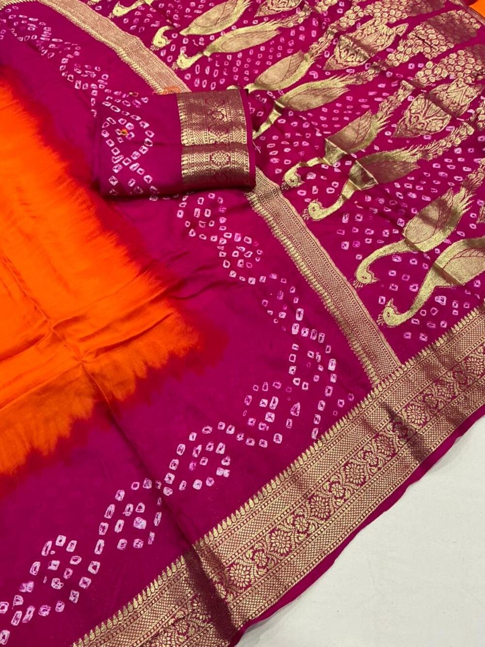Pure crape silk saree with zari woven border and rich pallu. Hand tied bhandani with two color shaded dying. Cotton tassles on apllu. Running blouse with aari mirror work. Saree- 5.5 meters. Blouse- 1 meter. - Image 2