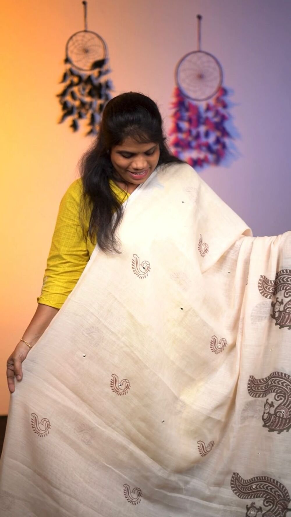 Soft Linen Saree With Aari Mirror Work Cream color. Cotton Tassles on pallu. Blouse - Running Linen Mirror Work on Prints. Full length 6.30 meters.