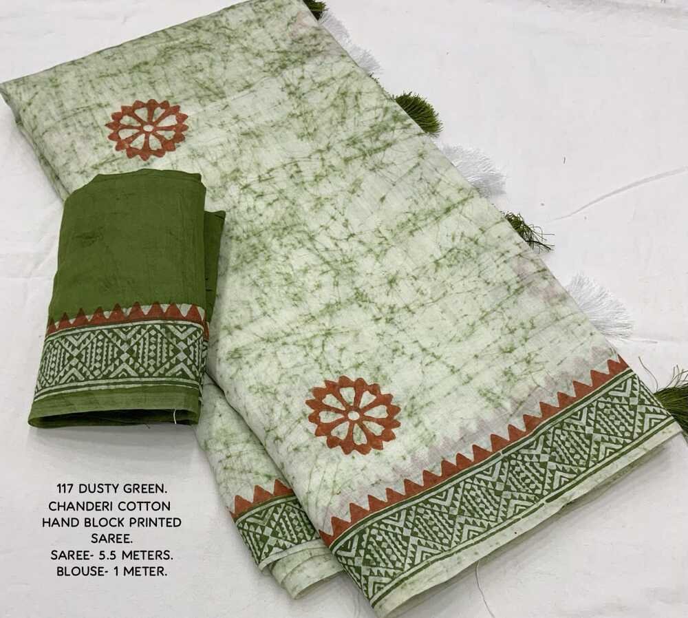 Hand block printed spray style cotton saree. Brush chanderi Quality- soft chanderi cotton saree with hand-block prints. Tassles on pallu. Blouse- contract block printed chanderi cotton blouse. Saree- 5.5 meters. Blouse - 1 meter