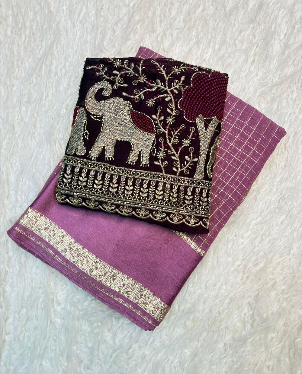 Georgette Chex Viscose Georgette saree with zari chex weaving all over Saree and satin border Comes with contrast marron colour beads embroidery work Blouse