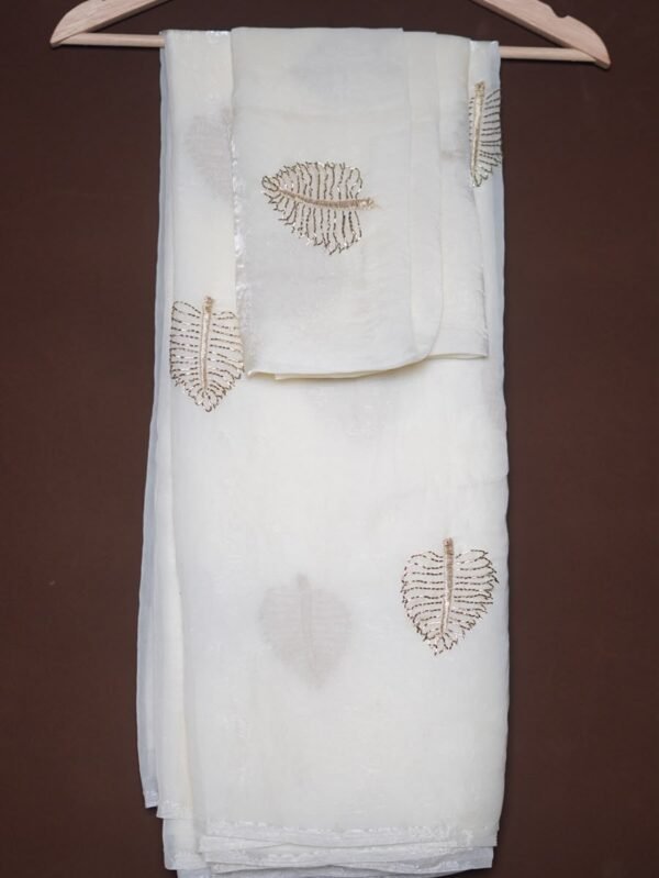 New Arrivals Pan leaf Space Silk  *Quality- soft & flowy Space Silk Saree with beads design butta work all over* Paired with running butti work space silk blouse