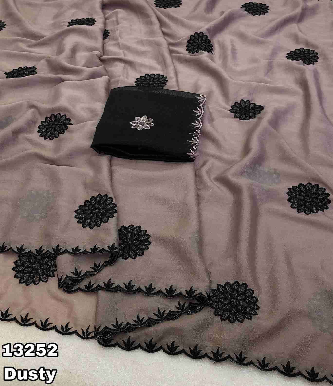 Fabric - Star georgette Embroidery work saree with scalloped cutwork border Blouse - Contrast embroidery work blouse Saree cut - 5.5 meter Blouse cut - 0.8 meter Weight - 550 Grams